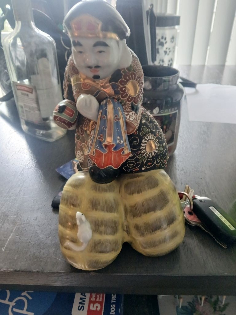 Vintage Japanese Kutani ware porcelain figurine of Daikoku